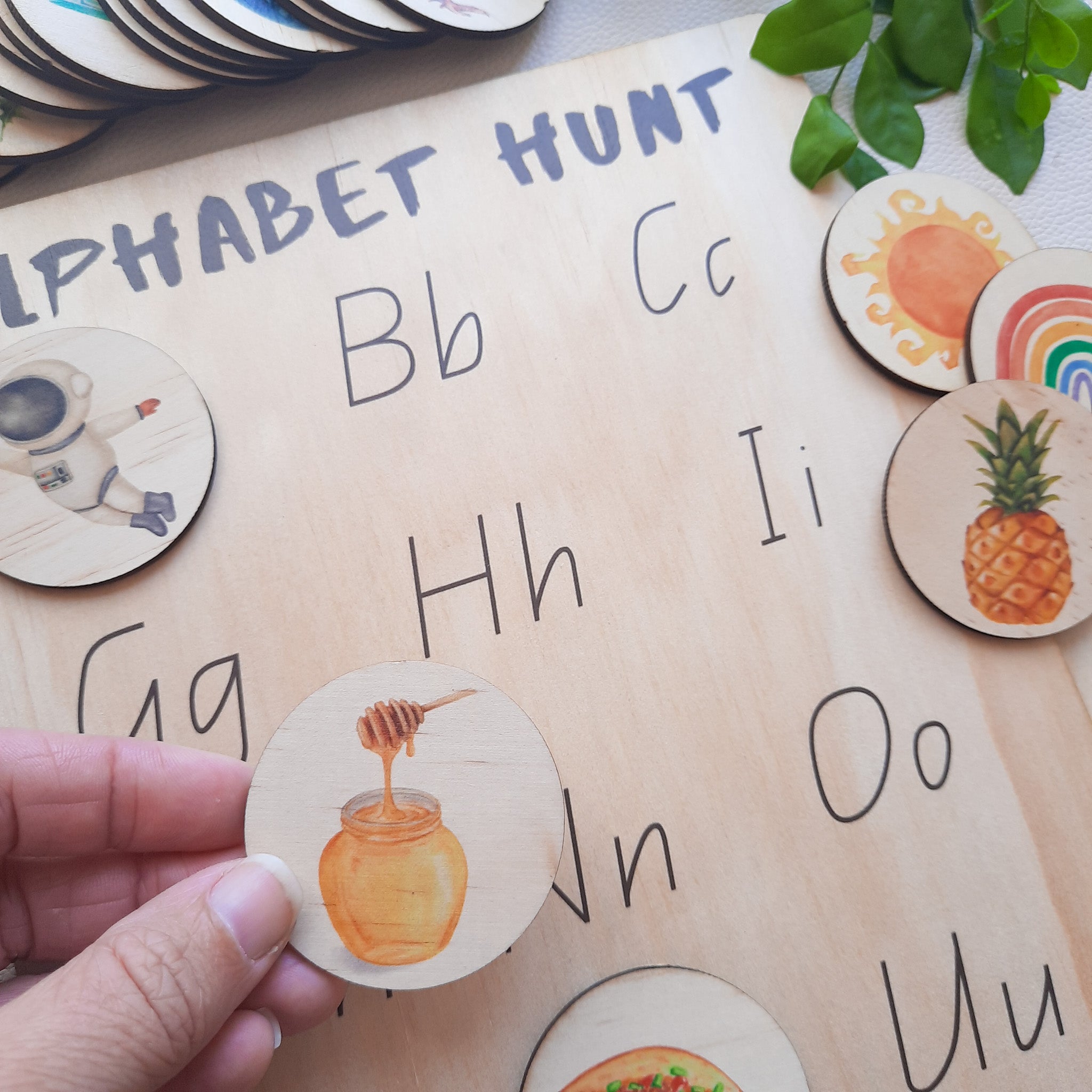 alphabet hunt - alphabet items - activity board