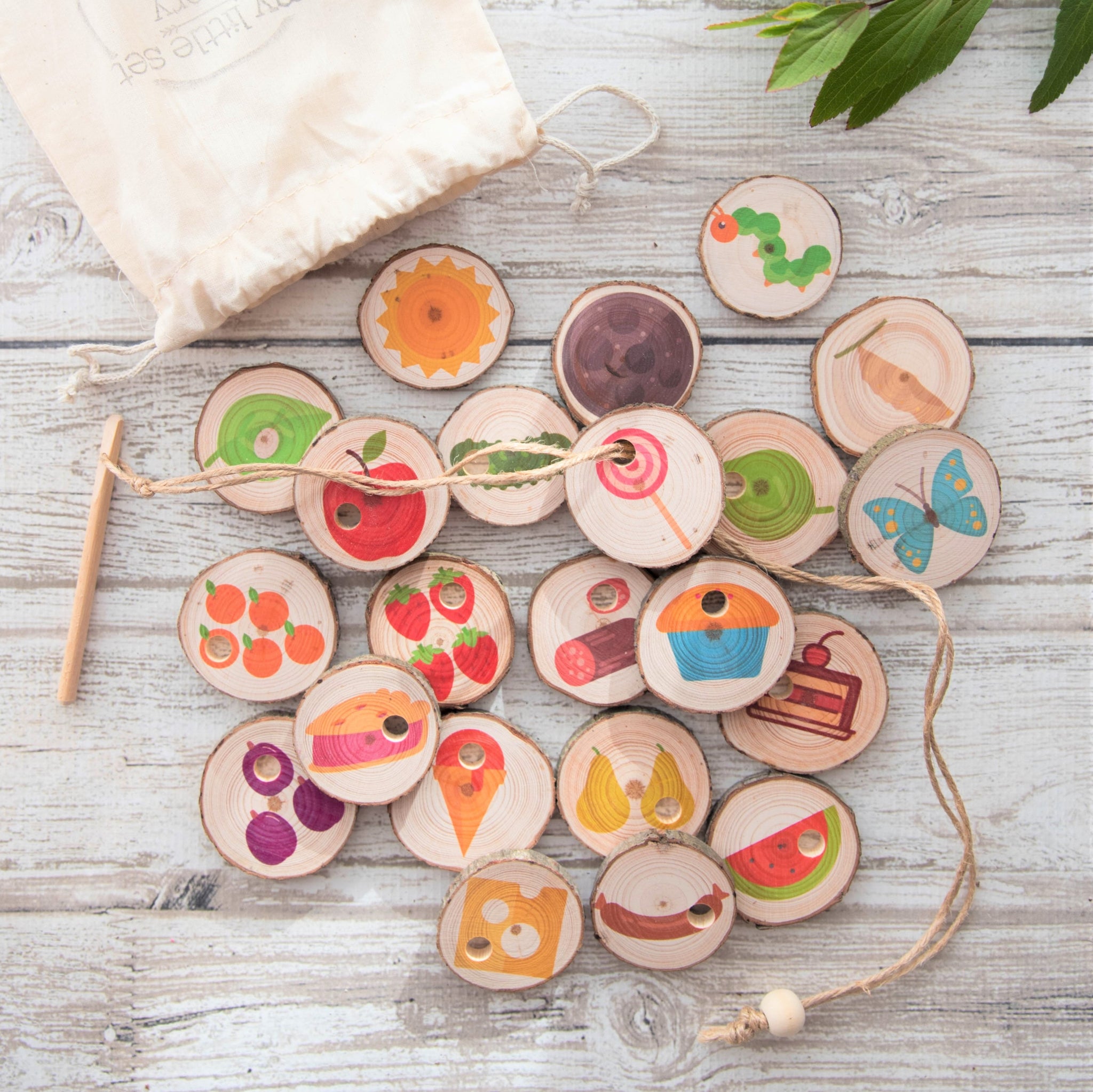 hungry caterpillar threading tree slices - story tellers